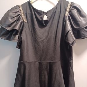 PEPLUM TOP WITH FAUX LEATHER SLEEVES & GILD BLING